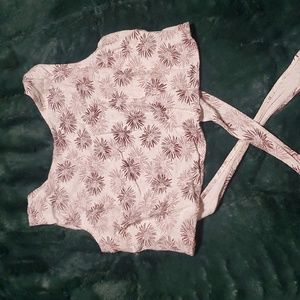 Medium tank top with open crozz back.